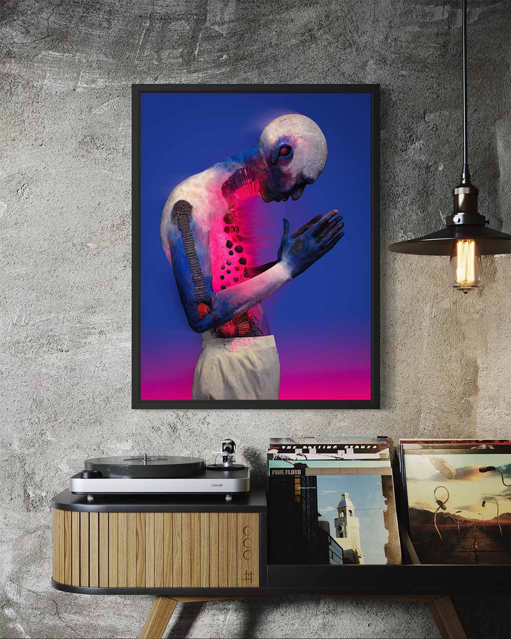 Poster mockup of a surreal artwork showing a glowing hybrid figure in a prayer pose, displayed in a modern interior.