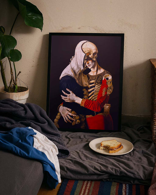 Poster leaning against the wall. The poster features two surreal figures in a final embrace.