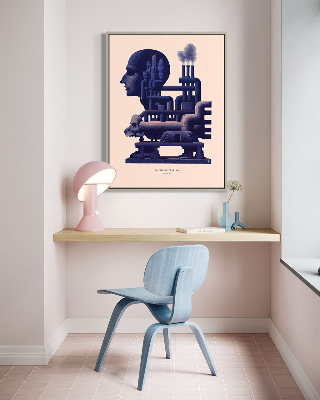 Modern interior with a framed artwork of a stylized industrial head on a wall above a desk.