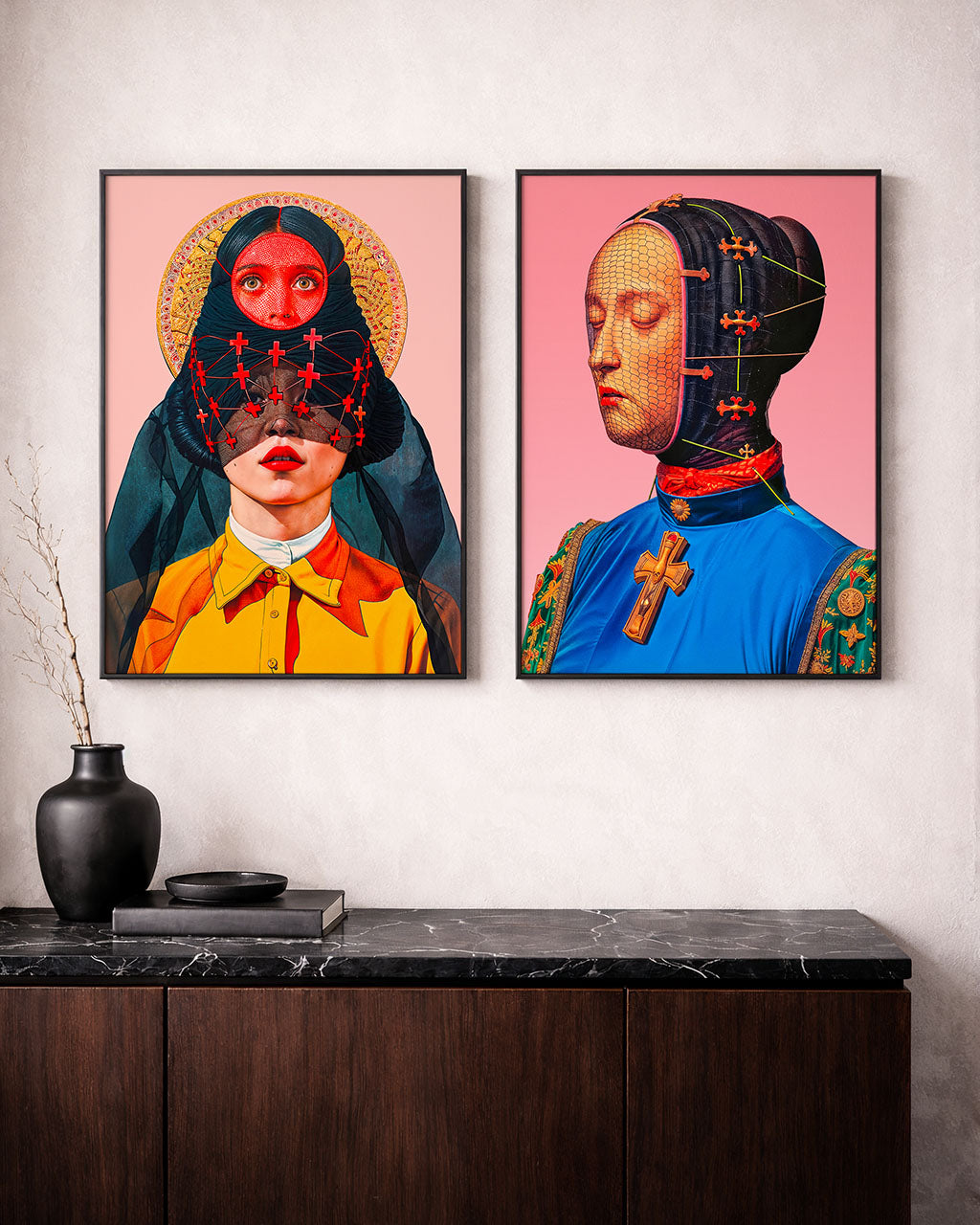 Two framed surreal portraits hanging side by side above a dark wooden cabinet, one showing a veiled figure with covered eyes and the other a figure with a mesh-covered face on a pink background.