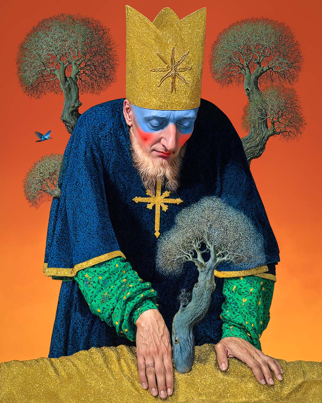 Surreal portrait of a crowned figure with blue and red face paint, wearing a dark robe and gold cross, leaning over a small tree against an orange background.