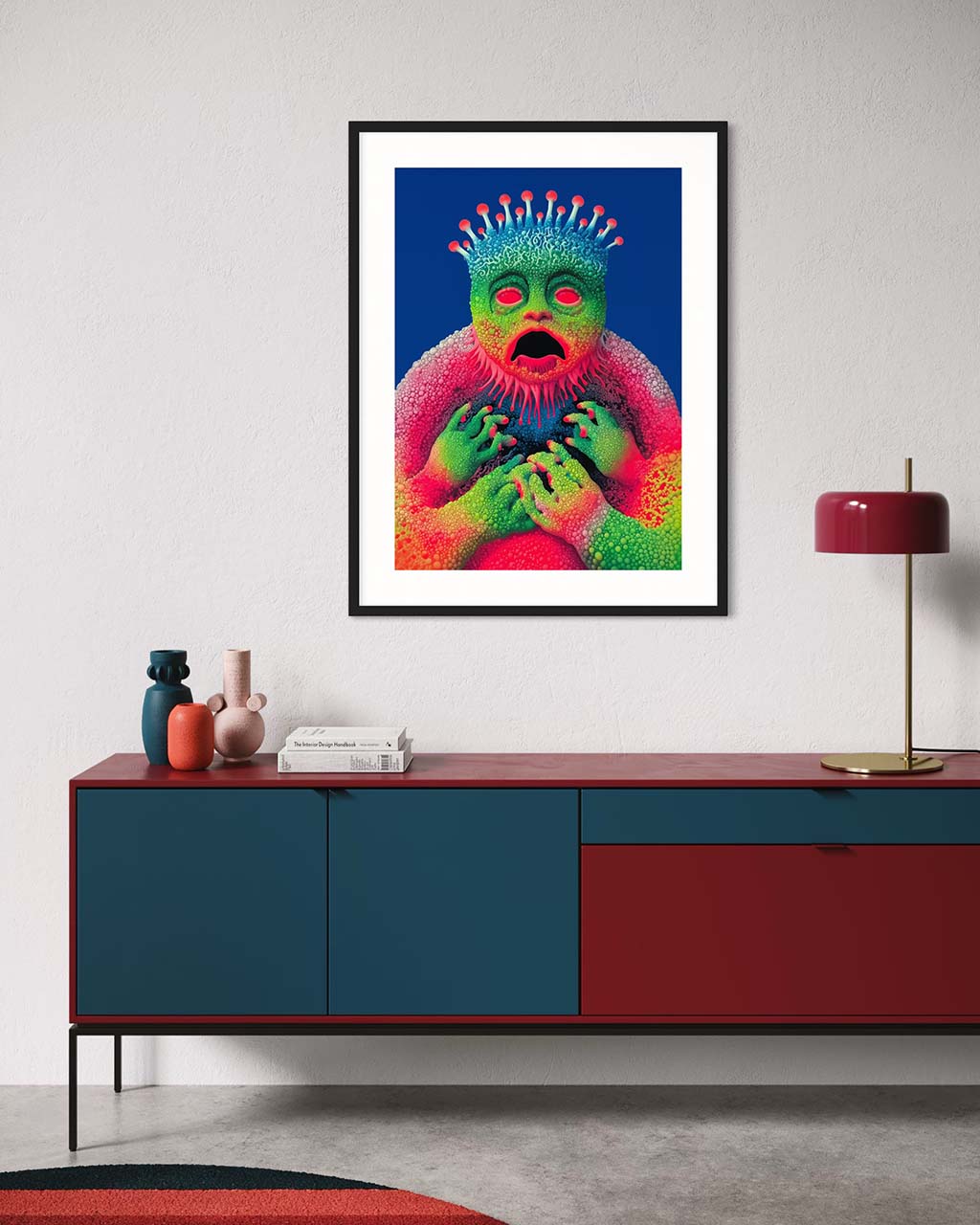 Colorful abstract art print of a creature on a wall above a modern sideboard.